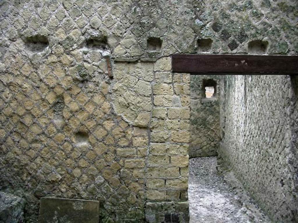 VI.13/11, Herculaneum. May 2003. Looking east in rustic storeroom, with doorway to kitchen.
Photo courtesy of Nicolas Monteix.